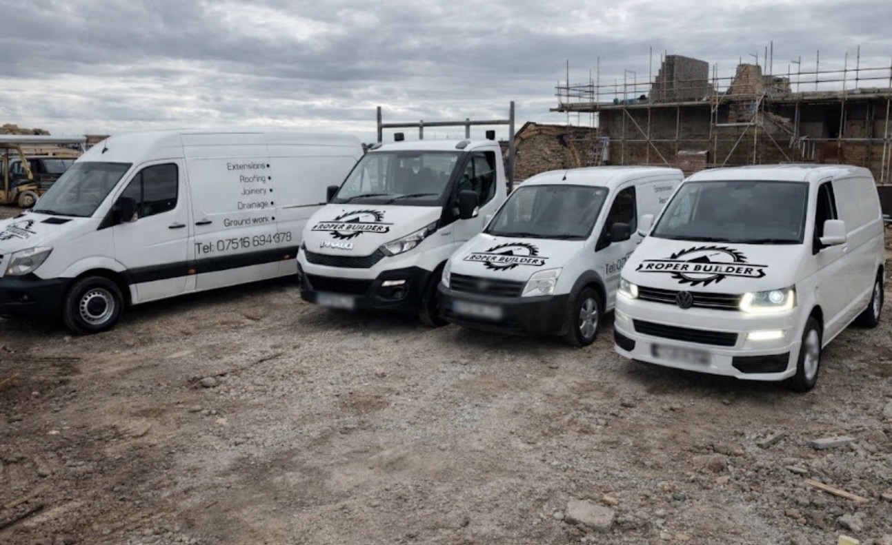J Roper Builders work vans at a building project